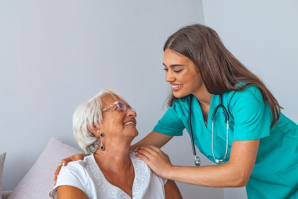 Healthcare professional providing compassionate senior care support in a residential care home