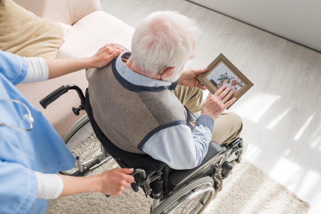 Caregiver supporting a senior with memory care needs