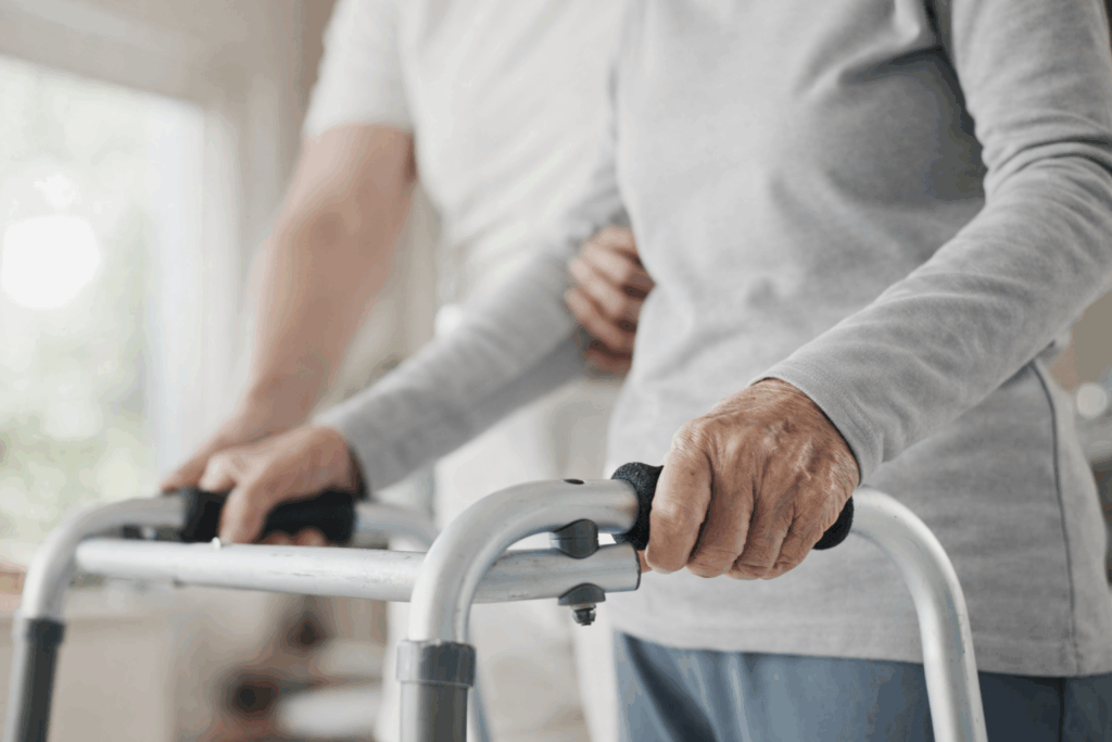 Elderly person using walker for safe mobility