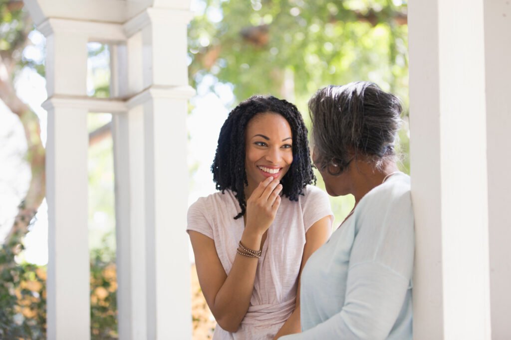 adult daughter talking with her mother about healthcare decisions