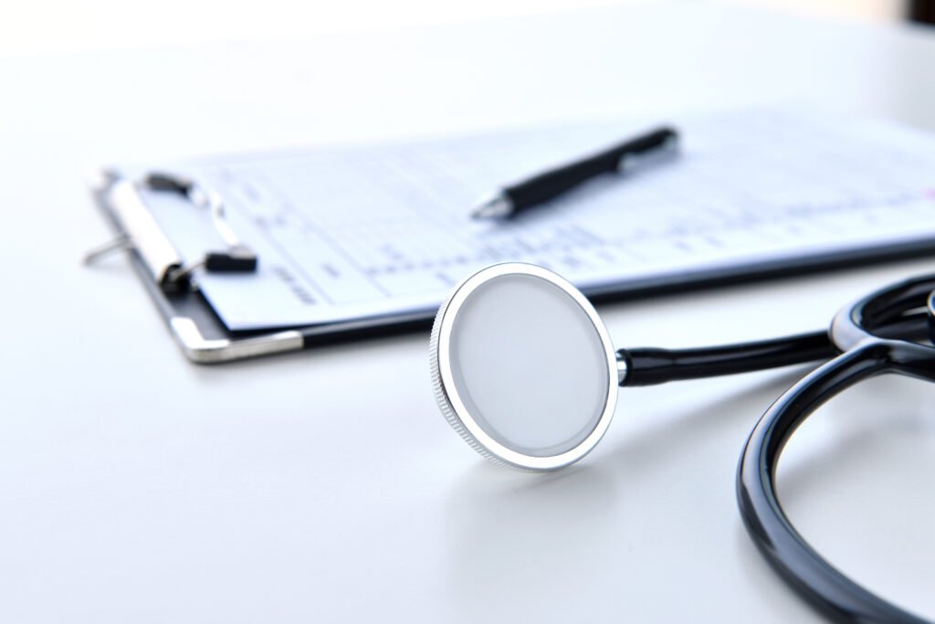 Hospital discharge planning checklist for seniors with medical clipboard and stethoscope