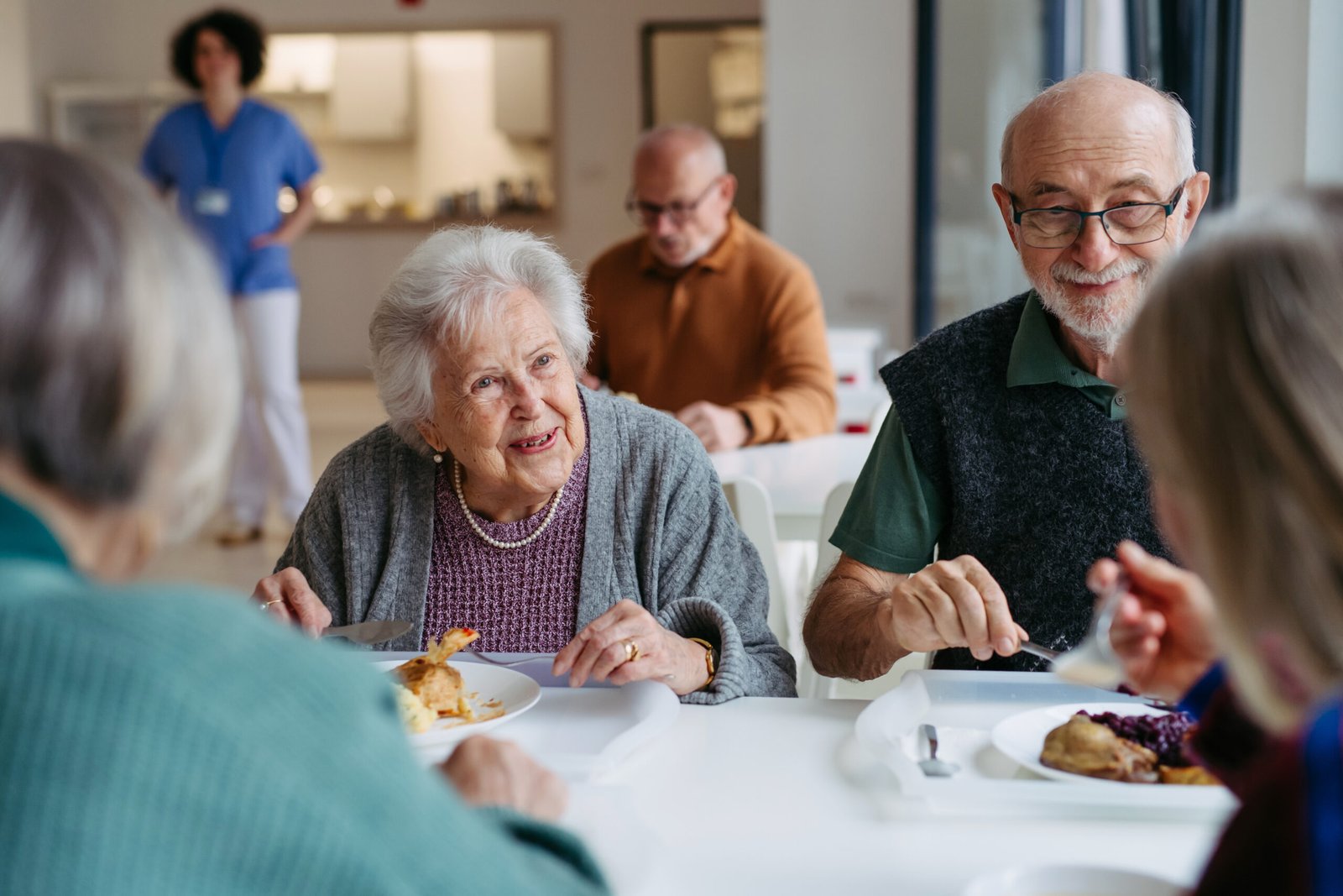 Assisted living residents enjoying daily activities