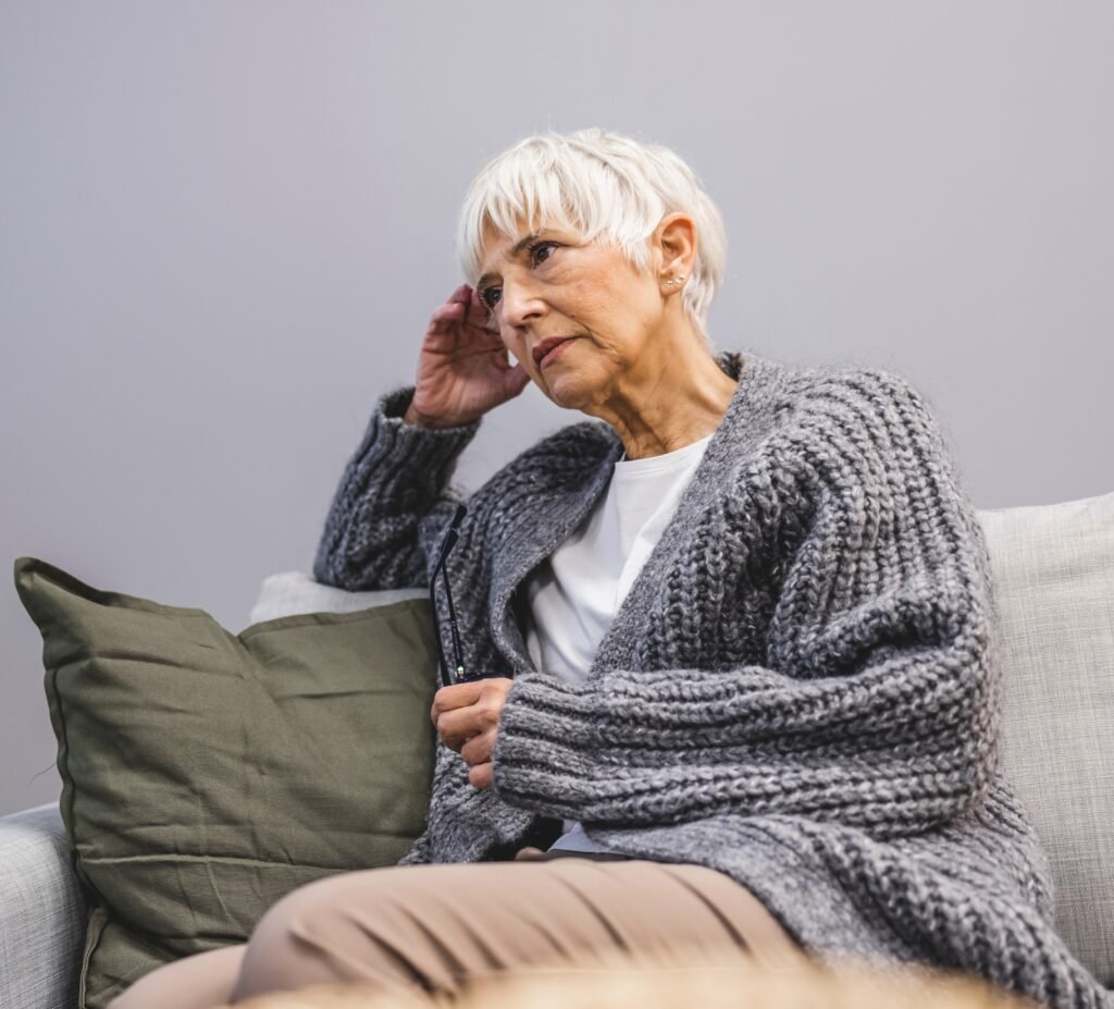 Caregiver burnout: Woman feeling emotionally exhausted and overwhelmed.