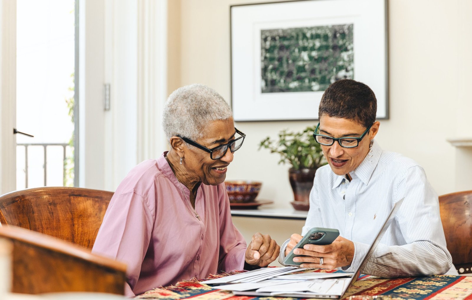 Caregiver balancing work and planning senior care