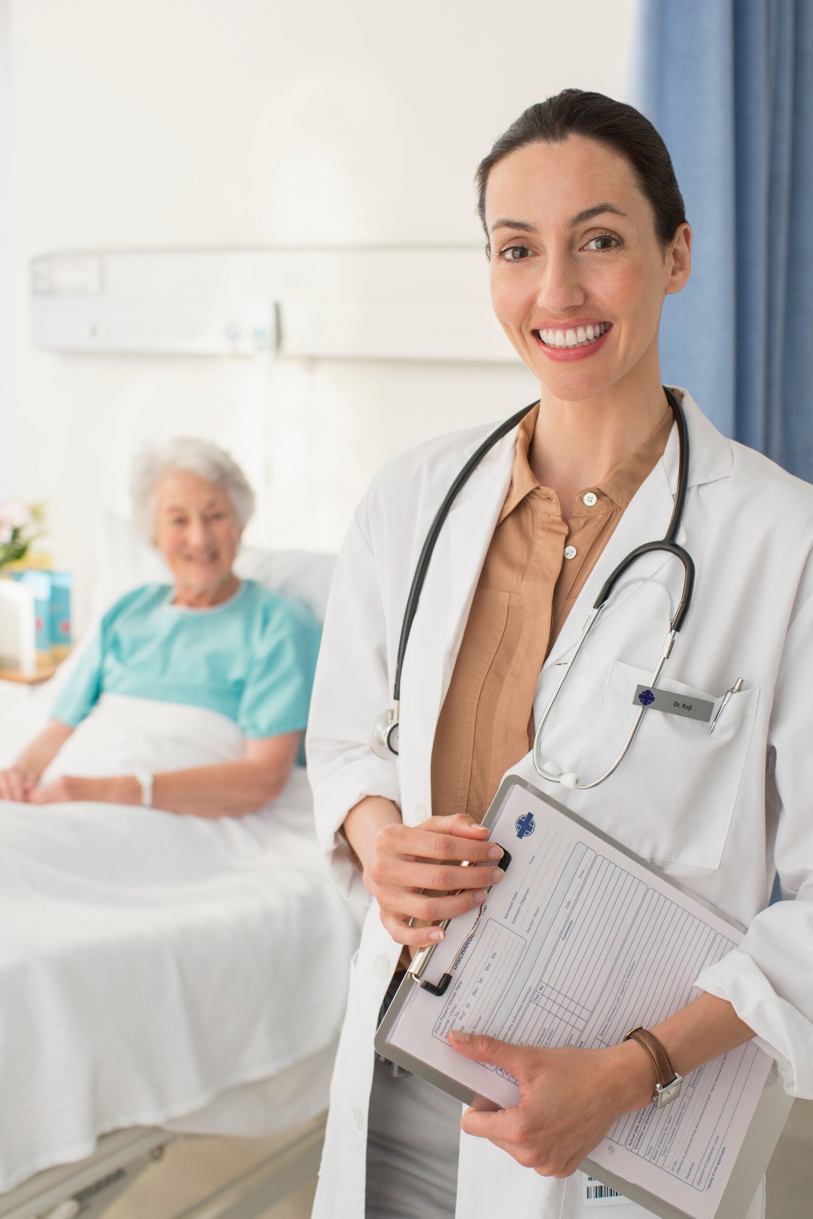 Healthcare professional supporting a family during discharge planning