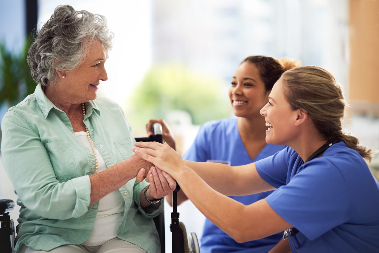Healthcare professional supporting a patient and family during care planning