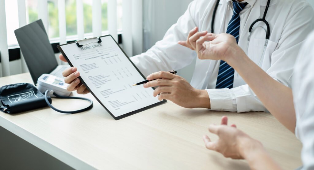 Doctor discussing "What does Medicare cover for long-term care?" with a patient during a care planning appointment.