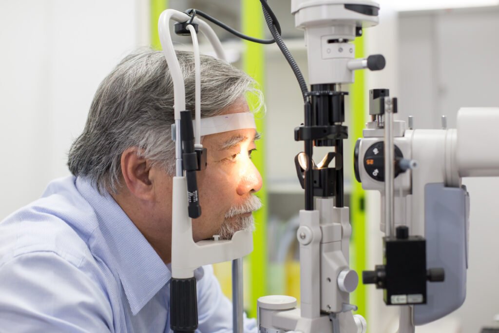 Older man receiving a comprehensive eye examination
