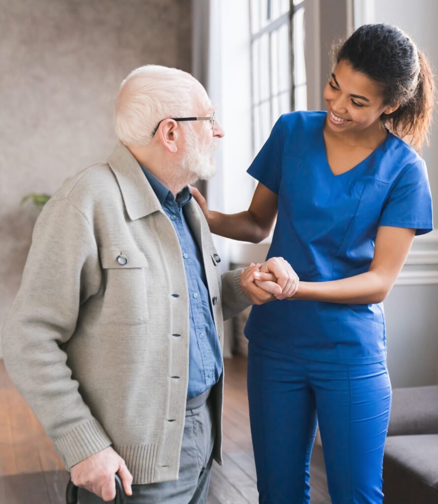 Caregiver supporting an older adult with dementia as increasing safety needs require additional care